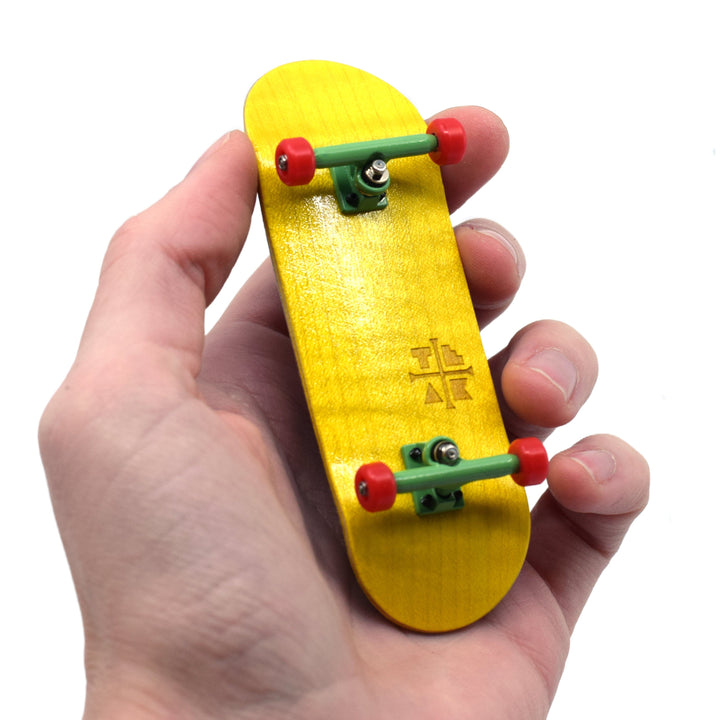 Teak Tuning 32mm Prolific Gen2 Fingerboard Complete - "Rad Rasta" Colorway - Gen2 Prodigy Trucks + Pro Duro Bubble Bushings