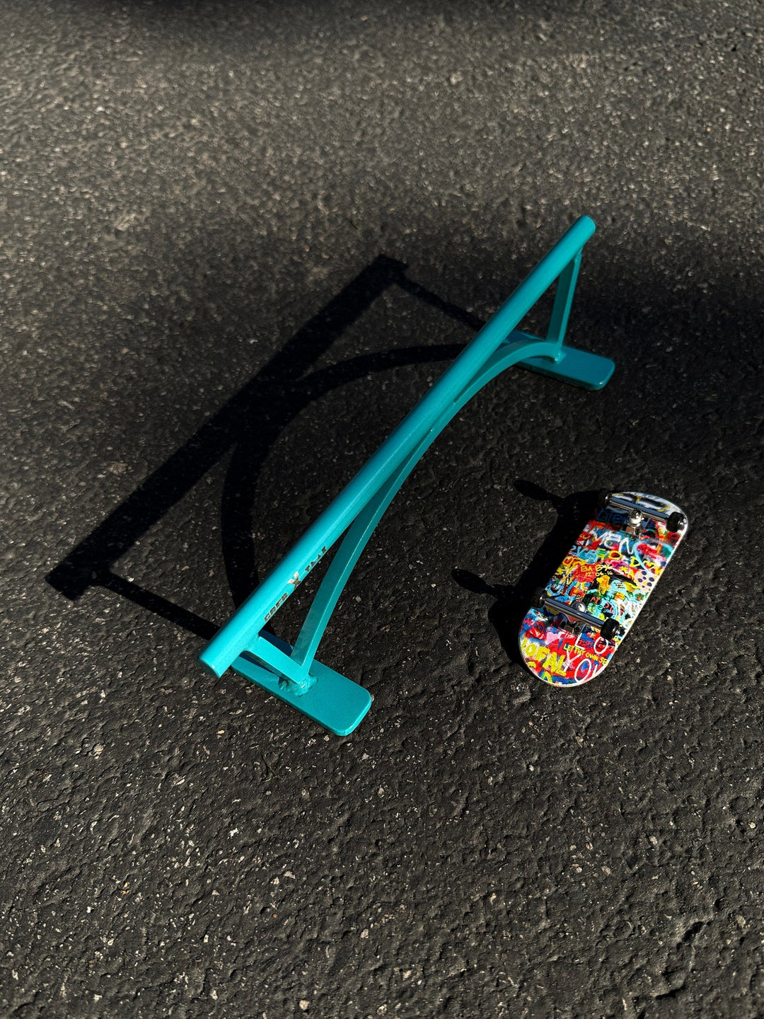 Teak Tuning Pro Fingerboards Teak x GrindRight Round Flat Bar Rail - 10 Inches - Limited Edition Teak Teal Colorway