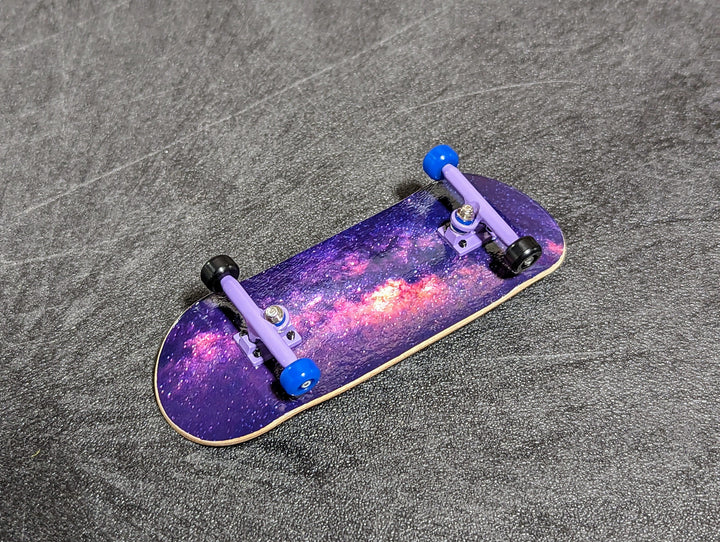 Teak Tuning 34mm Prolific Gen2 Fingerboard Complete - "Galaxy" Graphic - Gen2 Prodigy Trucks + Pro Duro Bubble Bushings