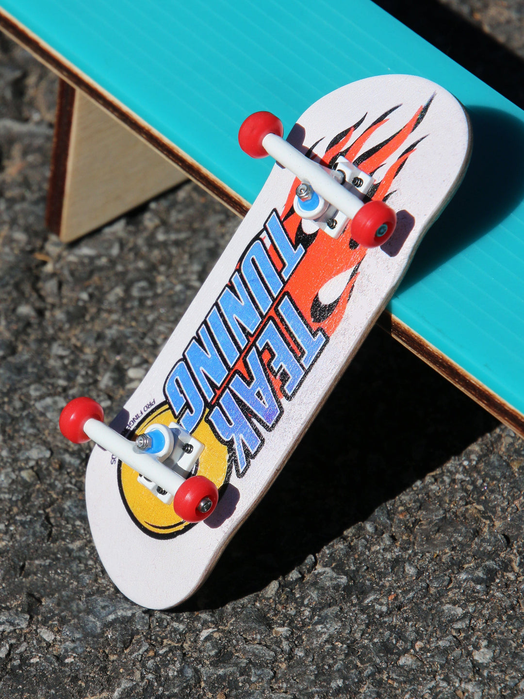 Teak Tuning 34mm Prolific Gen2 Fingerboard Complete - "Apex Burn Out" Graphic - Gen2 Prodigy Trucks + Pro Duro Bubble Bushings