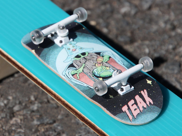 Teak Tuning 34mm Prolific Gen2 Fingerboard Complete - "Mystic Glow" Graphic - Gen2 Prodigy Trucks + Pro Duro Bubble Bushings