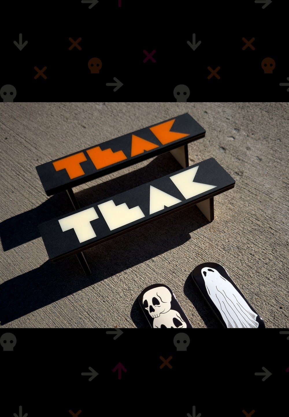 The Halloween drop: Session x Teak benches with orange and ivory TEAK inlays and the Ghost and Skulls Flow decks