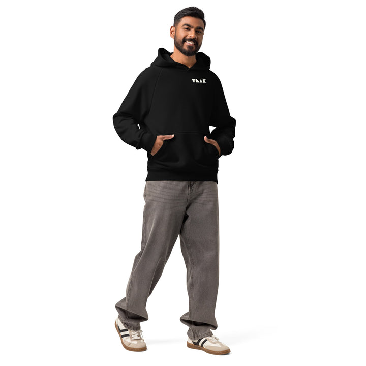 TEAK Outline Logo Heavyweight Hoodie in black, worn, front view